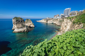 Naklejka premium Famous Raouche Rocks also called Pigeon Rock in Beirut, capital city of Lebanon