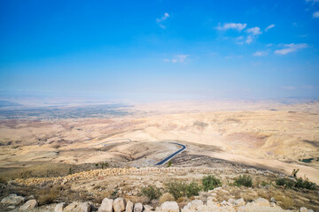 View from top of the Mount Nebo to the Jordanian desert valley. Desert land around the dead sea.