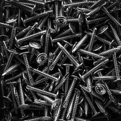 Closeup of steel screws background