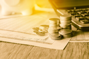 stacks of gold money coin background concept saving money with vintage filter 