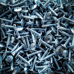 Closeup of steel screws background