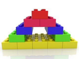 Toy bricks are assembled in the form of a pyramid