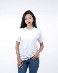 Fototapeta premium Front view white t-shirt Closeup on female body, woman girl in empty white t-shirt isolated on white background. Design woman t-shirt template and mockup for print.
