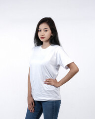 Front view white t-shirt Closeup on female body, woman girl in empty white t-shirt isolated on white background. Design woman t-shirt template and mockup for print.