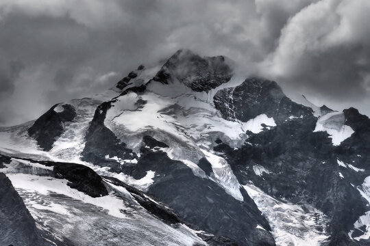 Scenic View Of Snowcapped Mountains Against Cloudy Sky © martin gstoehl/EyeEm