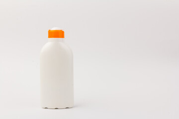 Sunscreen bottle on white background. Health concepts and skin care
