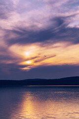 beautiful clouds during sunset over the lake