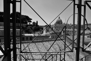 View from the roofs of St. Peter's Basilica in Rome. Black and white photo.