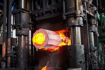 Forging a workpiece on a forging press. Forging production.