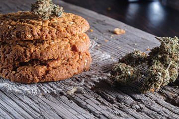 biscuits with hemp on an old wooden background close-up. rustic. Horizontal orientation.