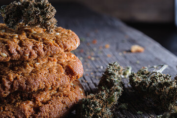biscuits with hemp on an old wooden background close-up. rustic. Horizontal orientation.