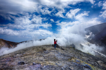 Taking pictures on Vulcano island ( Aeolian islands) day trip, Sicily, Italy