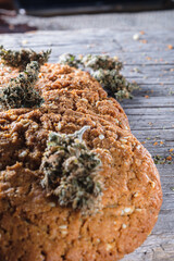 biscuits with hemp on an old wooden background close-up. rustic. Horizontal orientation.