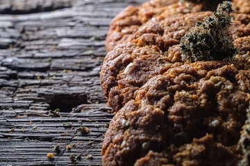 biscuits with hemp on an old wooden background close-up. rustic. Horizontal orientation.