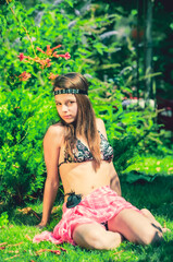 Naklejka na ściany i meble lovely brown haired young lady in tropical Florida swamp forest