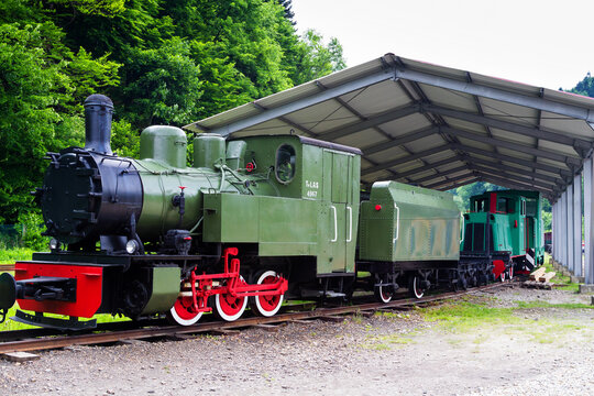 BIESZCZADY, POLAND - JUNE 3: Narrow-gauge railway, steam train. Tourist train rides in summer from Cisna to Przyslup in Bieszczady mountains, Poland on June 3, 2015.
