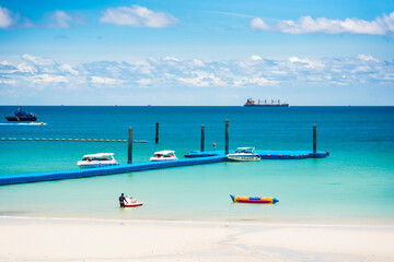 Chon Buri, Thailand - June, 27, 2020 :  Pictures of Unidentified name people on Tawaen Beach in the day time on Koh Lan island after the outbreak of the Covid 19 virus.