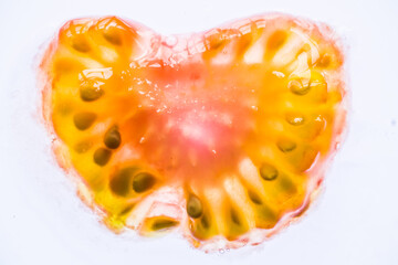 Close up of tomato seeds on white background