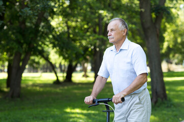 senior man riding a scooter in the park. Active Seniors