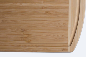 Wooden cutting board on a white background