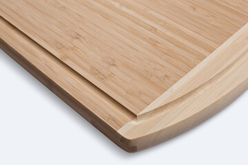 Wooden cutting board on a white background