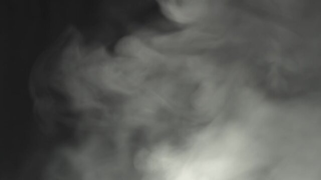 steam, smoke on a dark background