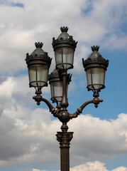 Fototapeta na wymiar Old street lamp in Paris 
