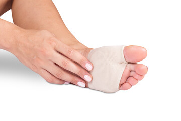 Metatarsal Sleeve Gel Pads on a white background. Woman feet with orthopedic pads isolated on white