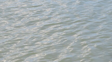 Light blue marble water surface, natural water background 