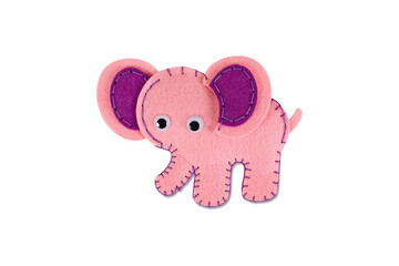 Needlework. Sewing toy with colored thread. Handmade soft toy. Needle, texture. Toy owl on a white background