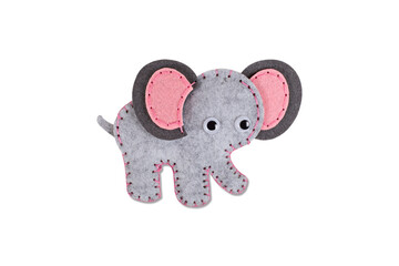 Needlework. Sewing toy with colored thread. Handmade soft toy. Needle, texture. Toy owl on a white background