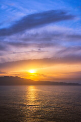 Naklejka na ściany i meble Sea sunset with dramatic sky seascape. Crete island, Greece