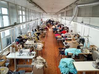 Fototapeta na wymiar Women working on textile production