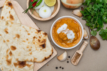 Various indian food menus, biryani rice, butter chicken, tandoori, bean curry and naan bread