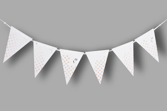 White paper bunting party flags isolated on gray background with natural shadows. Template
