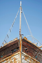 The ruined bow of an old wooden ship