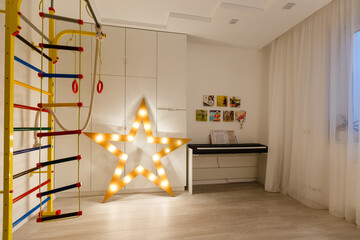 Hovel decorated with garland for children's party at home