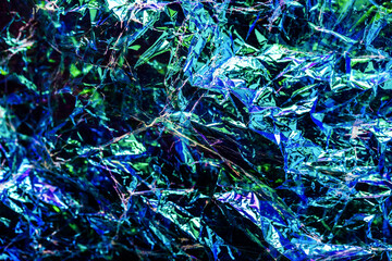 Holographic iridescent modern abstract crinkled foil background