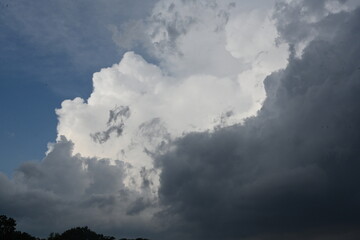 Mixed puffy white and grey storm clouds