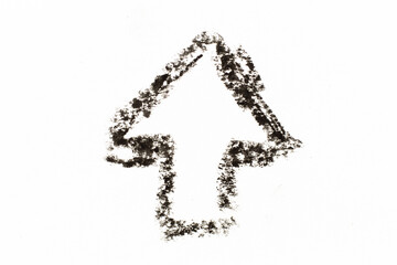 Black color oil pastel drawing in arrow shape on white paper background