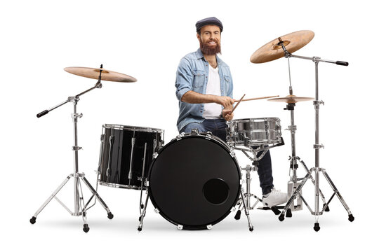 Bearded musician playing a set of drums
