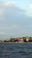 Fototapeta premium Watching Istanbul from the Passenger Ferry, Bosphorus bridge and Maiden's tower