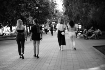 crowd of people walking in the city