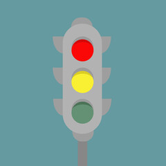 Classic three-way traffic light with red, yellow and green lights for crossing the road and stopping cars