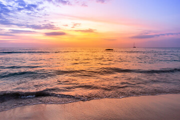 Fototapeta na wymiar Sunset on beautiful beach, evening outdoor day light, relaxing by the peaceful beach
