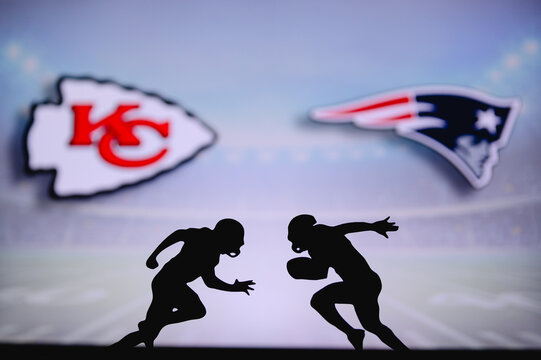Kansas City Chiefs vs. New England Patriots. NFL match poster. Two american football players silhouette facing each other on the field. Clubs logo in background. Rivalry concept photo.