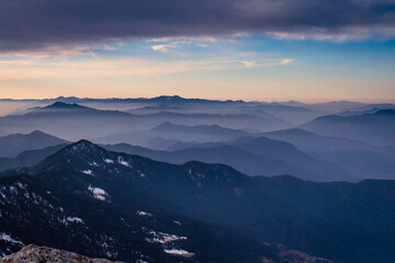 Obraz na płótnie Canvas Sunrise over the mountains of the Himalayan range of India, amazing view of the Himalaya in winter trek to Kedarkantha peak.