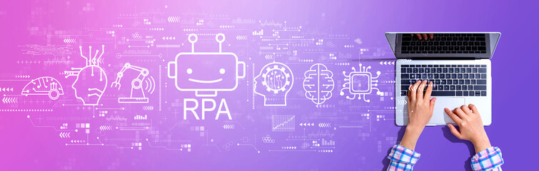 Obraz na płótnie Canvas Robotic Process Automation RPA theme with woman using a laptop computer
