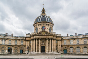 Fototapeta na wymiar Institute de France housed within one of French capital’s most beautiful buildings: a former school, College des Quatre-Nations, built by Cardinal Mazarin between 1662 and 1688. Paris, France.