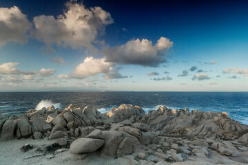 Rocks by the sea during a sunny day at Capo Testa, north of Sardinia, Italy. 